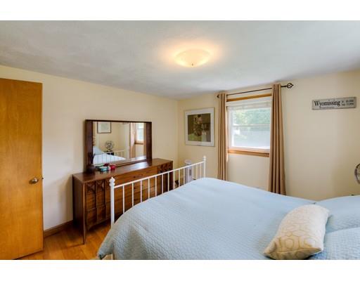 56 Edgewood Street Three Rivers, MA 01080 - Photo 21 of 30 a bedroom with a bed and a flat screen tv