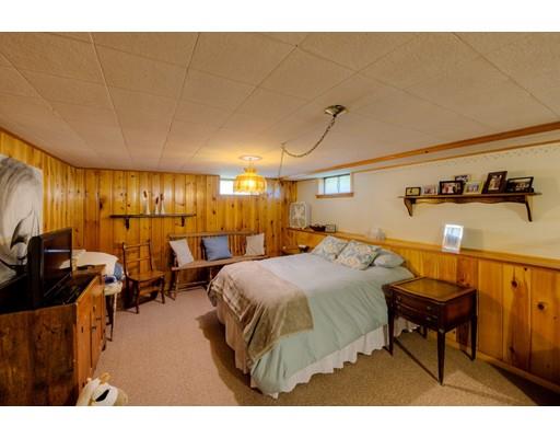 56 Edgewood Street Three Rivers, MA 01080 - Photo 23 of 30 a bedroom with a bed and lamp