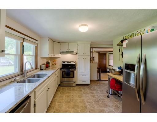 56 Edgewood Street Three Rivers, MA 01080 - Photo 4 of 30 a kitchen with refrigerator and window