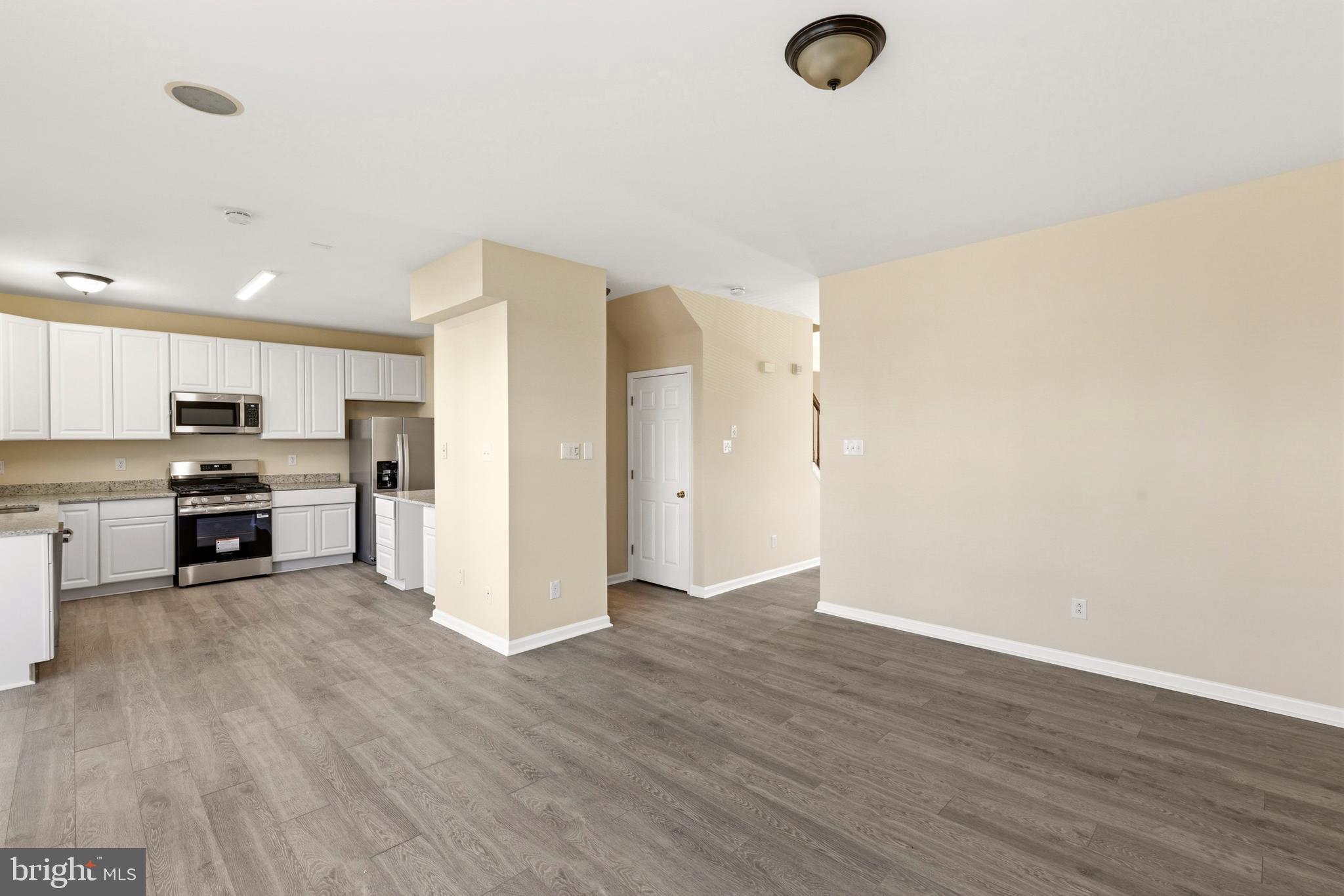 4704 Denview Way Baltimore, MD 21206 - Photo 11 of 42 a view of kitchen with wooden floor