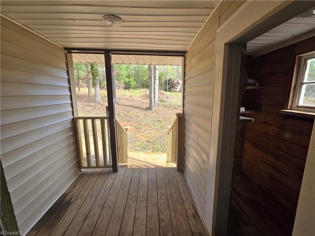 253 Hilton Road Stokesdale, NC 27357 - Photo 16 of 18 Back Porch