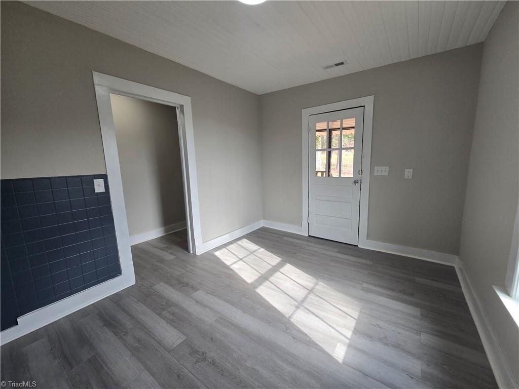 253 Hilton Road Stokesdale, NC 27357 - Photo 8 of 18 Kitchen Leads out to the back yard