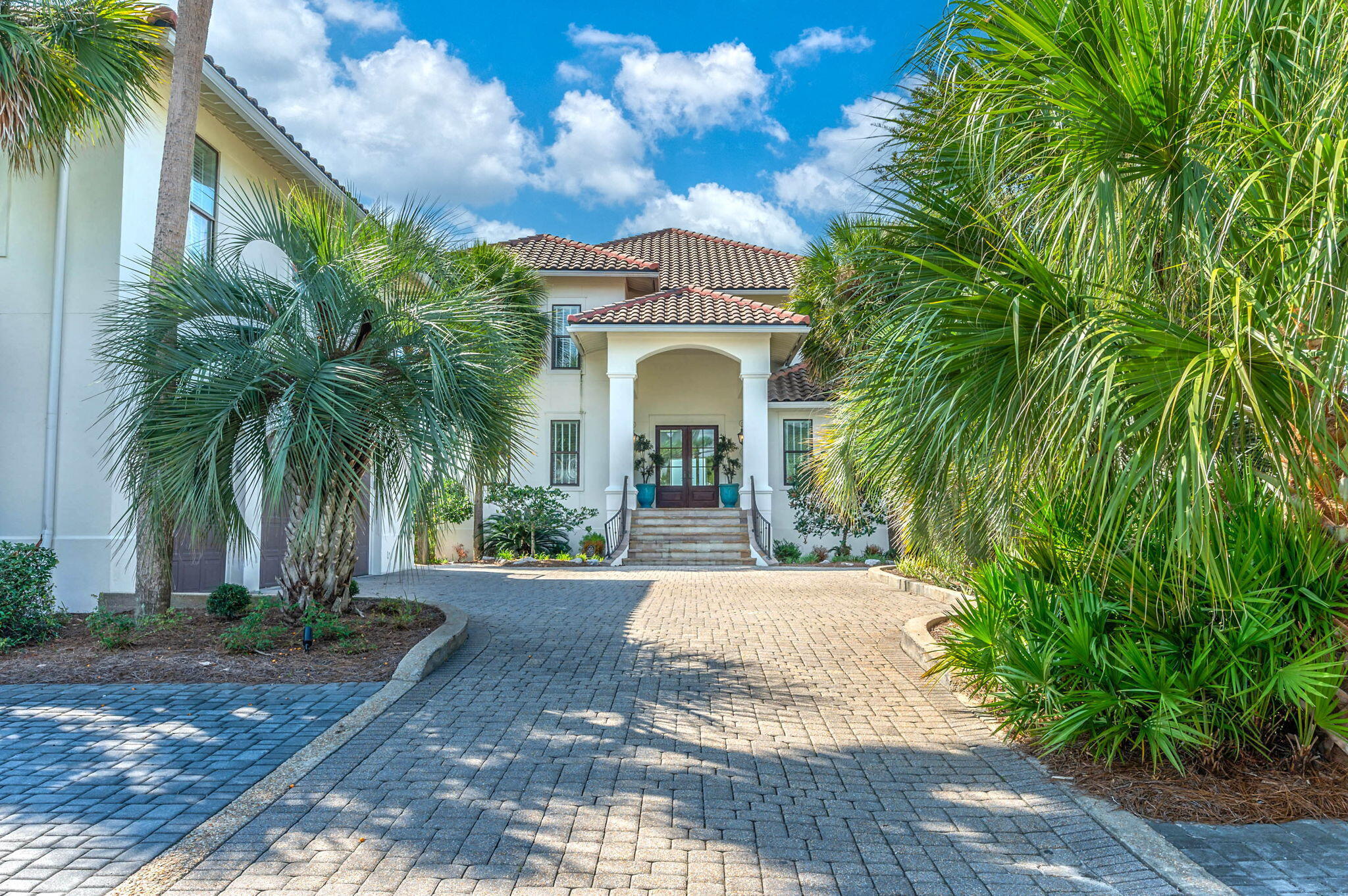 4525 West County Highway 30A Santa Rosa Beach, FL 32459 - Photo 110 of 118 a front view of a house with a garden