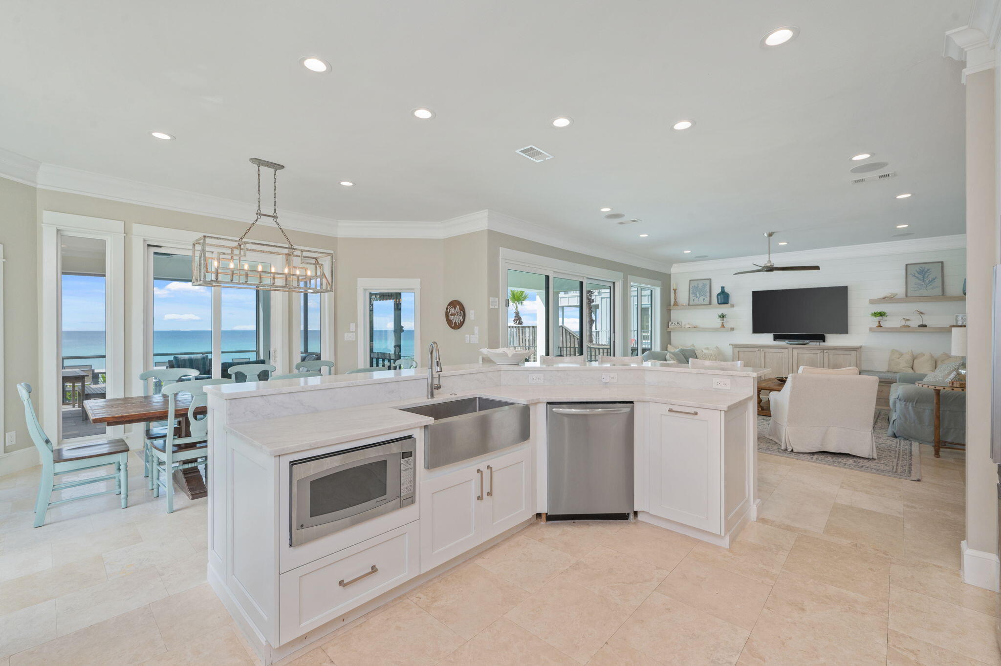 4525 West County Highway 30A Santa Rosa Beach, FL 32459 - Photo 25 of 118 a kitchen with white cabinets and white appliances