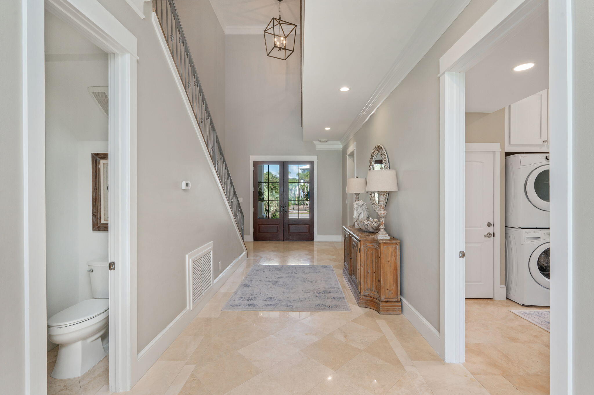 4525 West County Highway 30A Santa Rosa Beach, FL 32459 - Photo 45 of 118 a view of a hallway with bathroom and wooden floor
