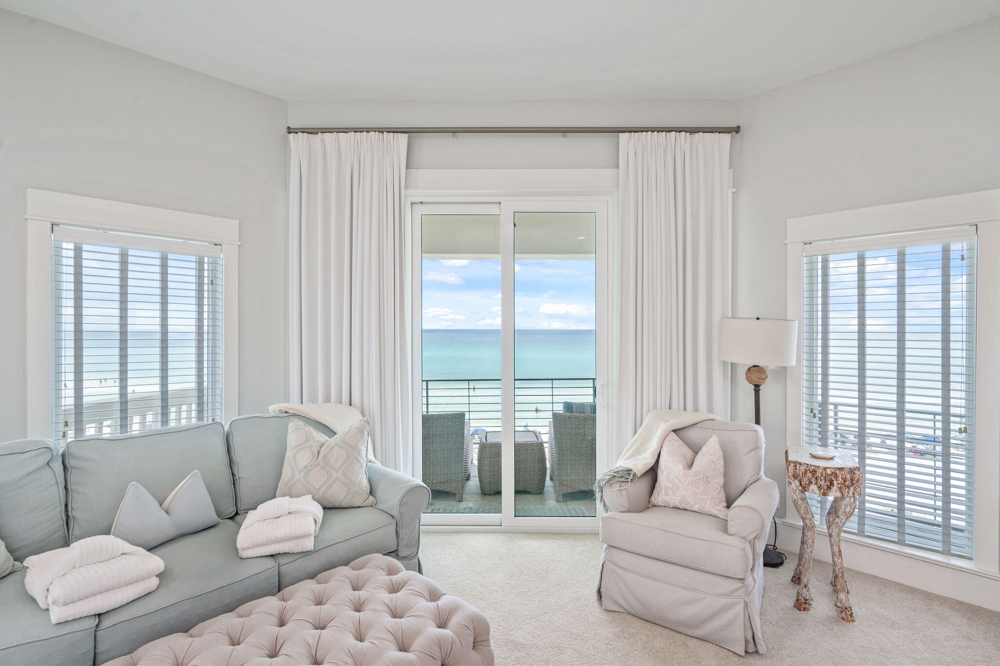 4525 West County Highway 30A Santa Rosa Beach, FL 32459 - Photo 66 of 118 a living room with furniture and a large window with outer view