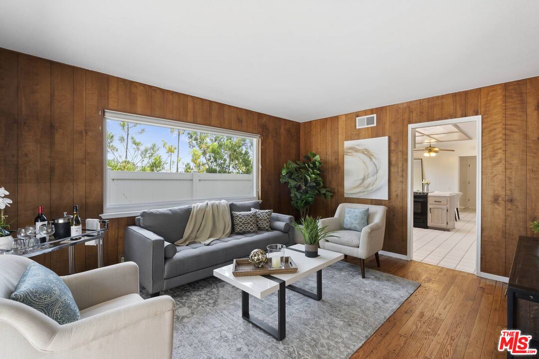 26741 Nokomis Road Rancho Palos Verdes, CA 90275 - Photo 13 of 28 a living room with furniture and a large window