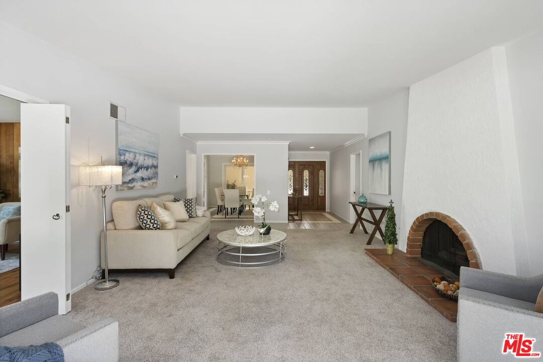 26741 Nokomis Road Rancho Palos Verdes, CA 90275 - Photo 15 of 28 a living room with furniture and a table