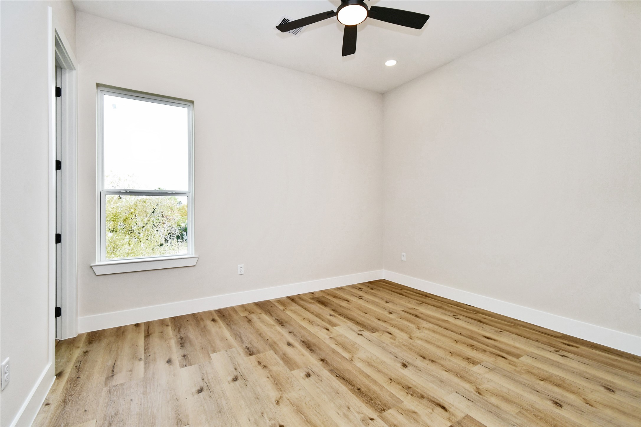 3231 Tuam Street Houston, TX 77004 - Photo 39 of 49 an empty room with a window
