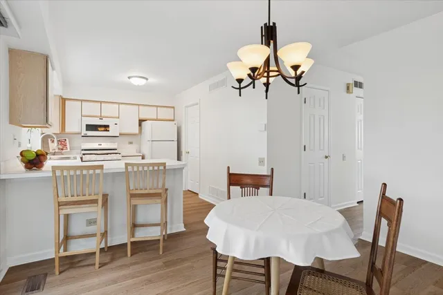 a view of kitchen with breakfast area