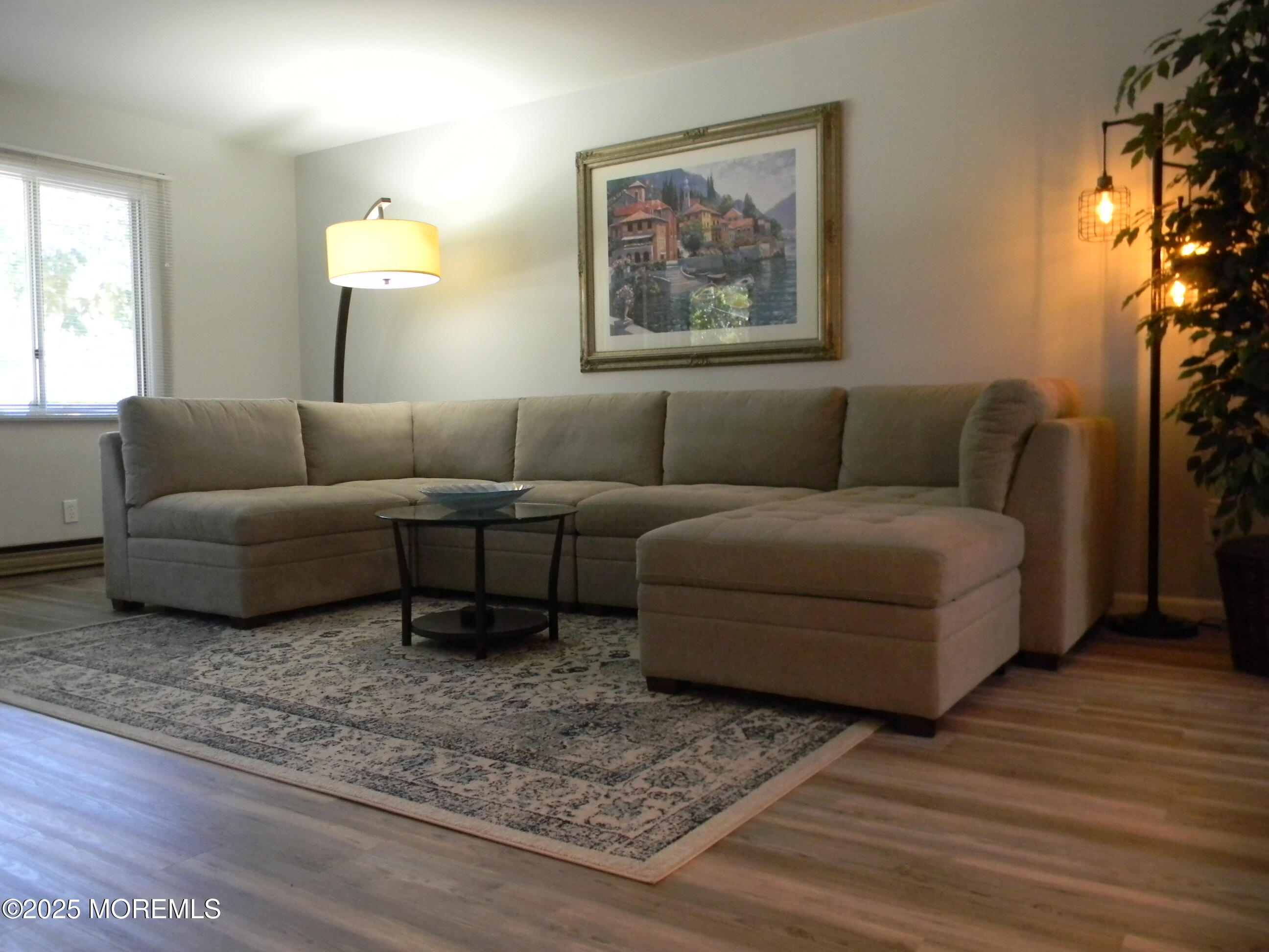 7 B Roosevelt City Road, Unit B Whiting, NJ 08759 - Photo 20 of 48 a living room with furniture and a window