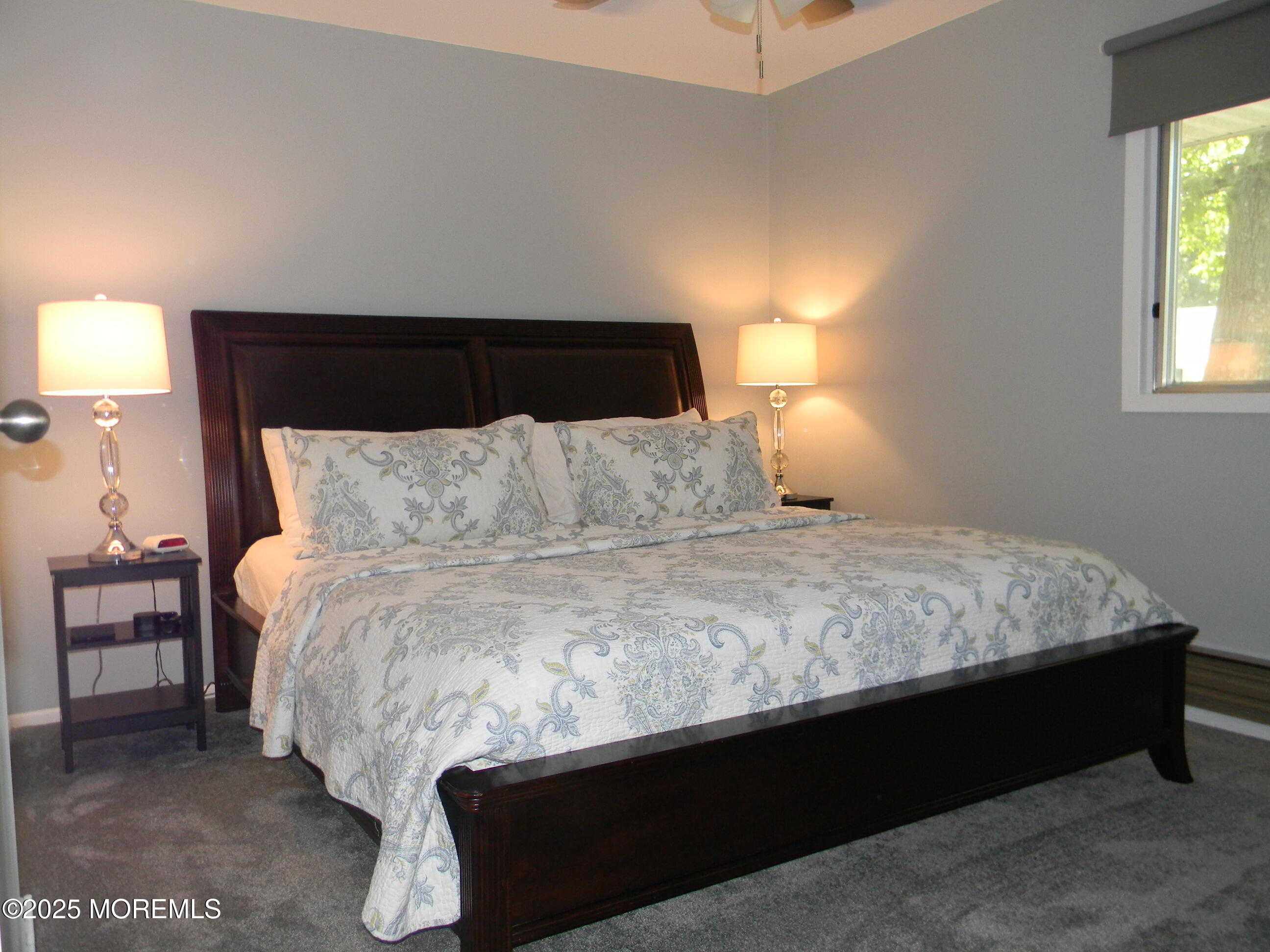 7 B Roosevelt City Road, Unit B Whiting, NJ 08759 - Photo 23 of 48 a bedroom with a bed and window