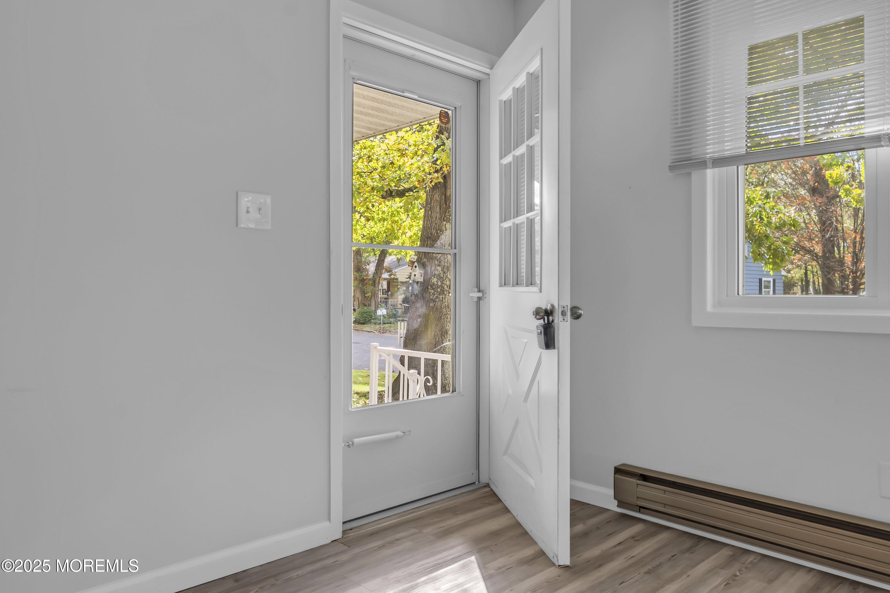 7 B Roosevelt City Road, Unit B Whiting, NJ 08759 - Photo 3 of 48 an entryway and a window in a room