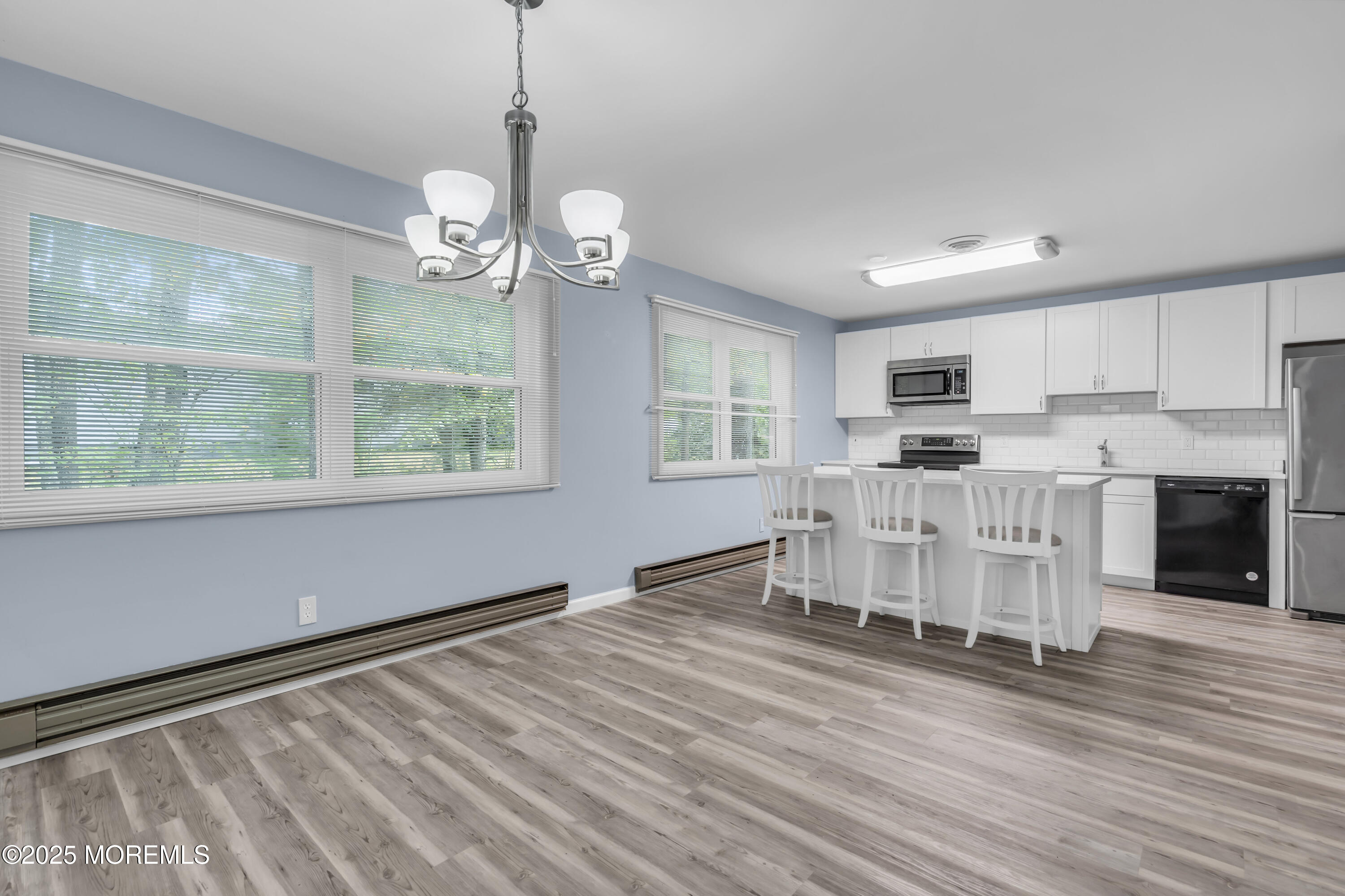 7 B Roosevelt City Road, Unit B Whiting, NJ 08759 - Photo 39 of 48 a view of kitchen with granite countertop cabinets and wooden floor