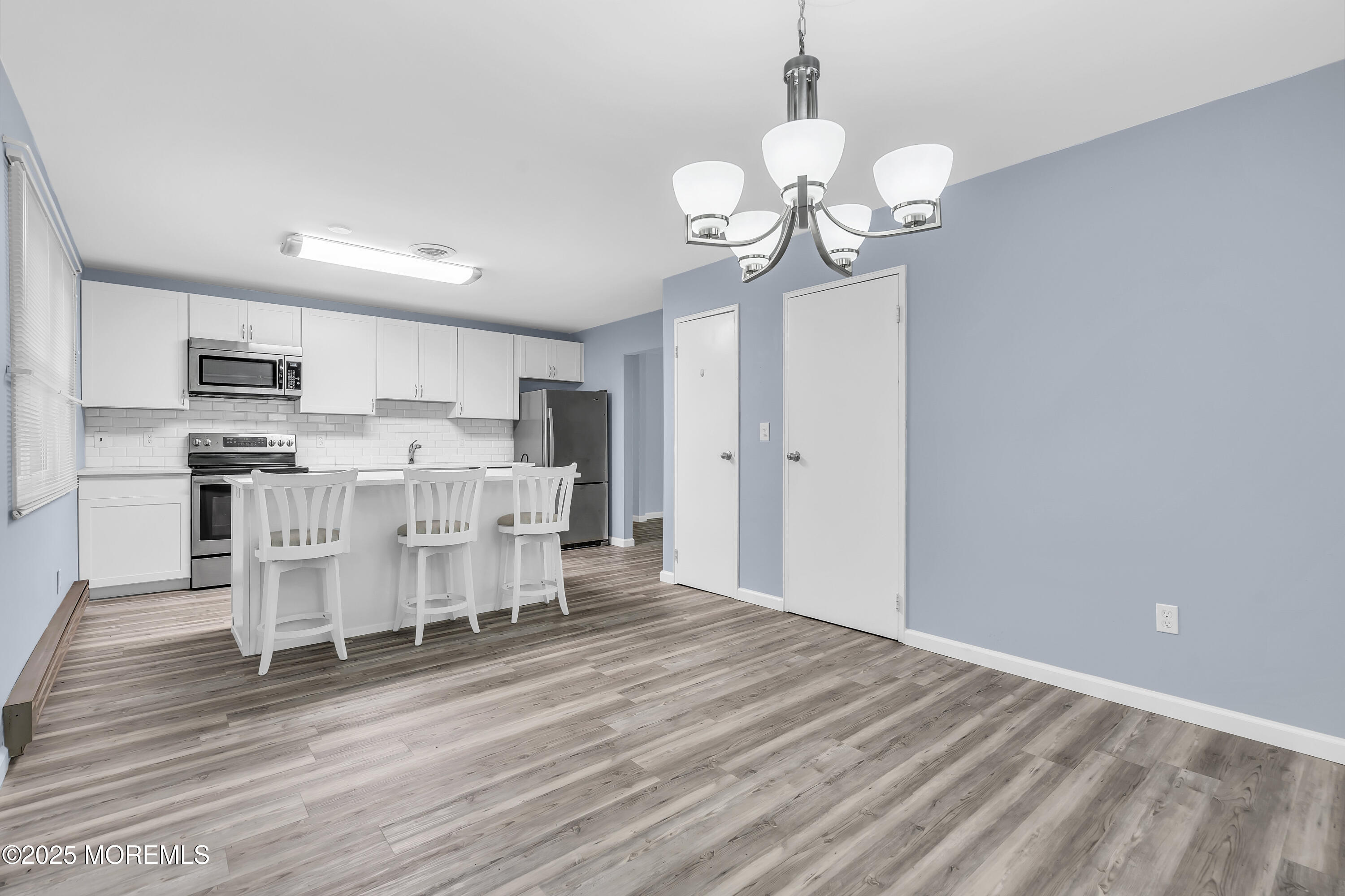7 B Roosevelt City Road, Unit B Whiting, NJ 08759 - Photo 40 of 48 a view of kitchen with furniture and wooden floor