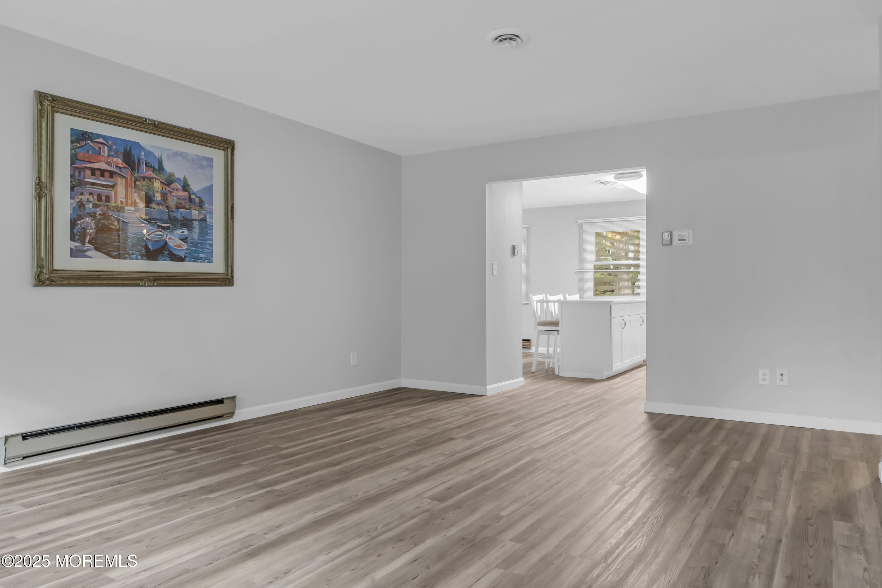 7 B Roosevelt City Road, Unit B Whiting, NJ 08759 - Photo 4 of 48 a view of a room with wooden floor and window