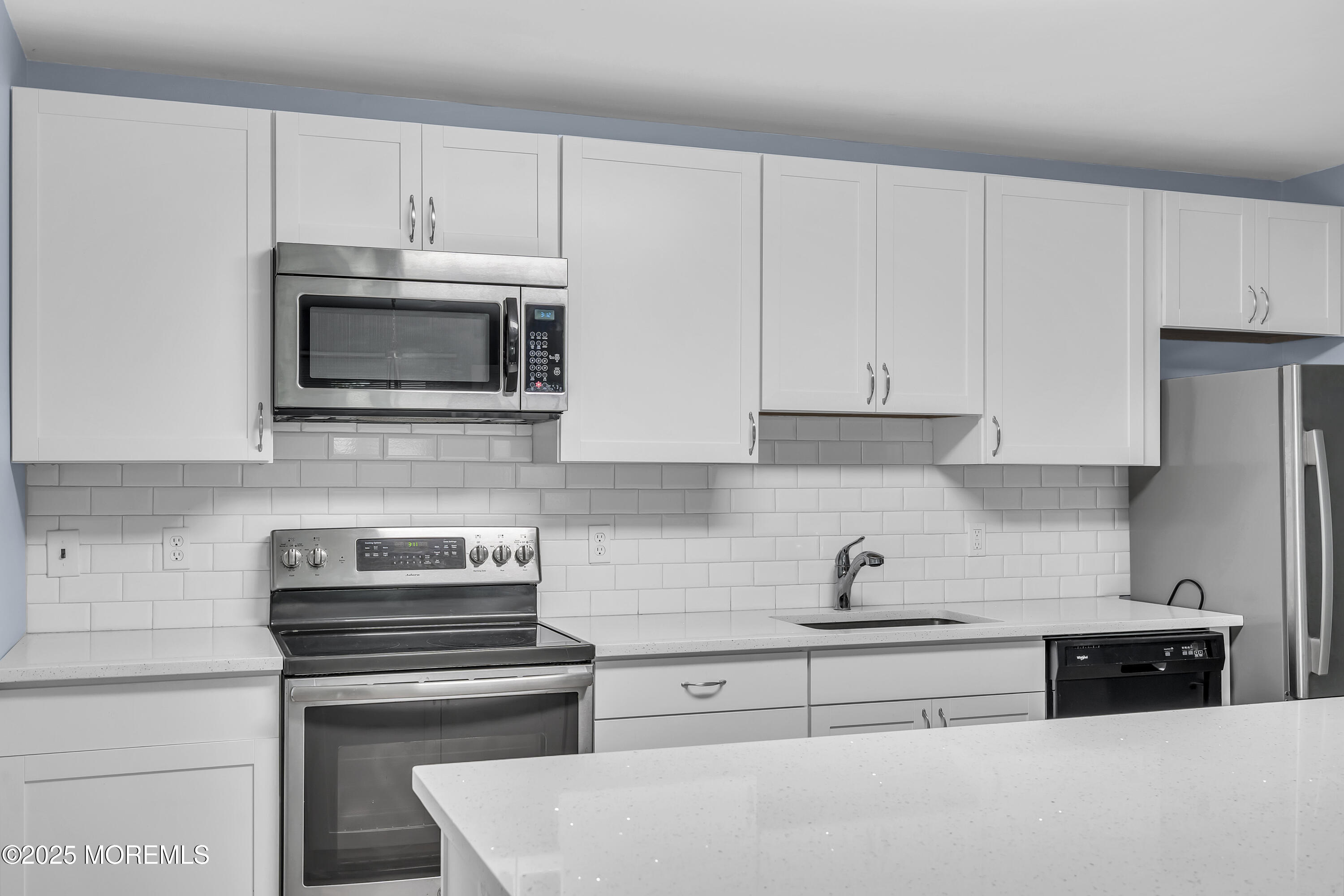 7 B Roosevelt City Road, Unit B Whiting, NJ 08759 - Photo 42 of 48 a kitchen with cabinets stainless steel appliances and a counter space