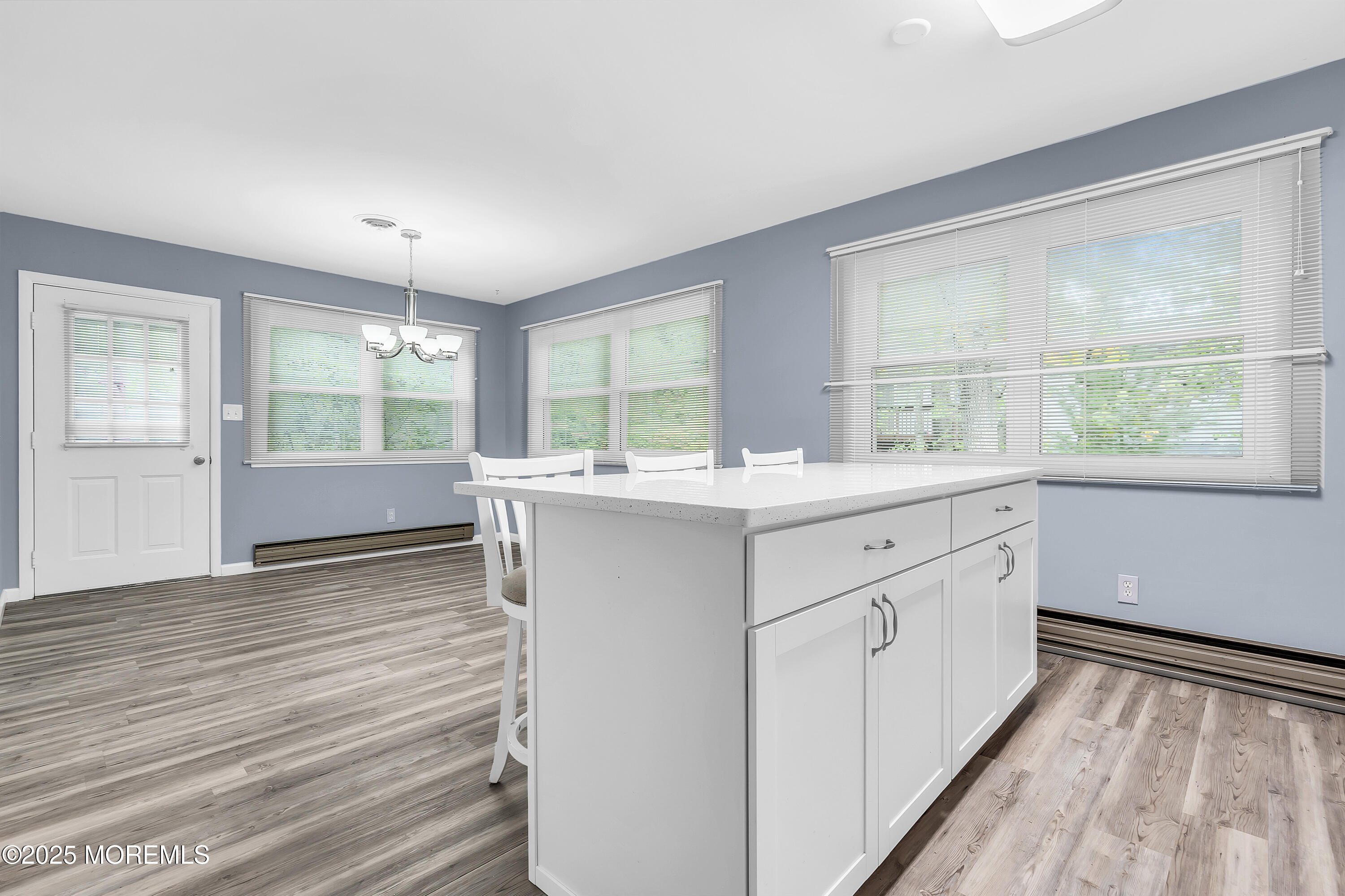 7 B Roosevelt City Road, Unit B Whiting, NJ 08759 - Photo 8 of 48 a kitchen with a sink window and cabinets