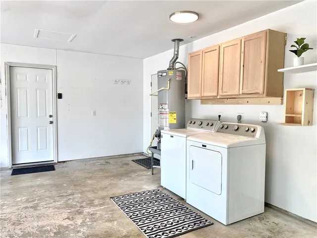 a room view with a washer and dryer