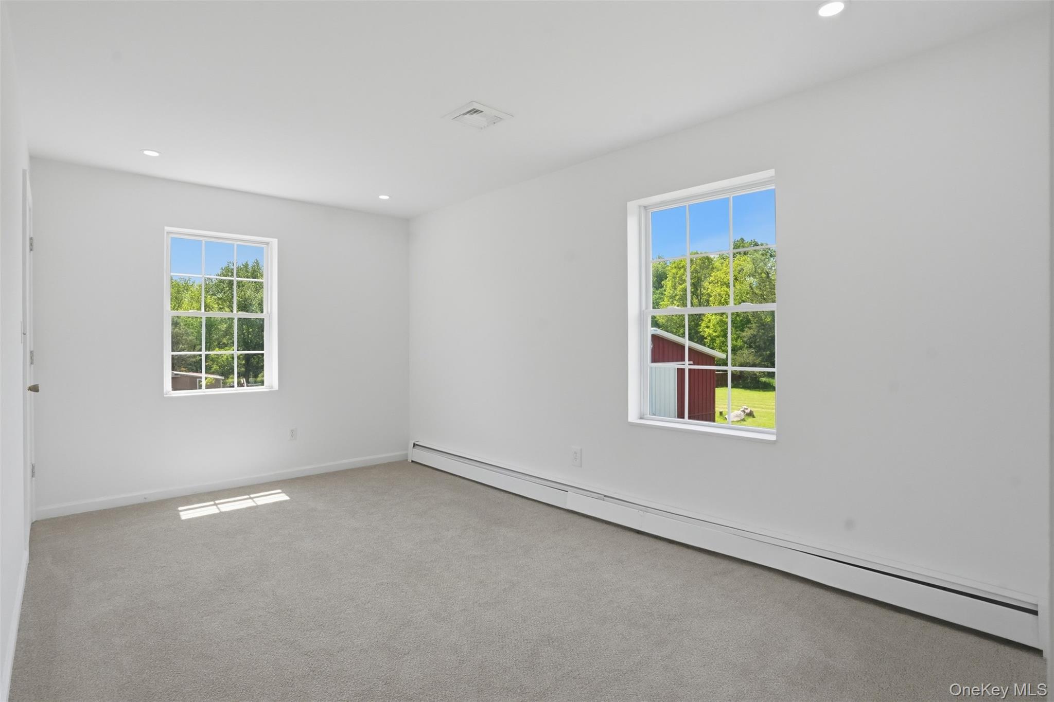 160 Pirog Road Pine Bush, NY 12566 - Photo 21 of 50 an empty room with windows
