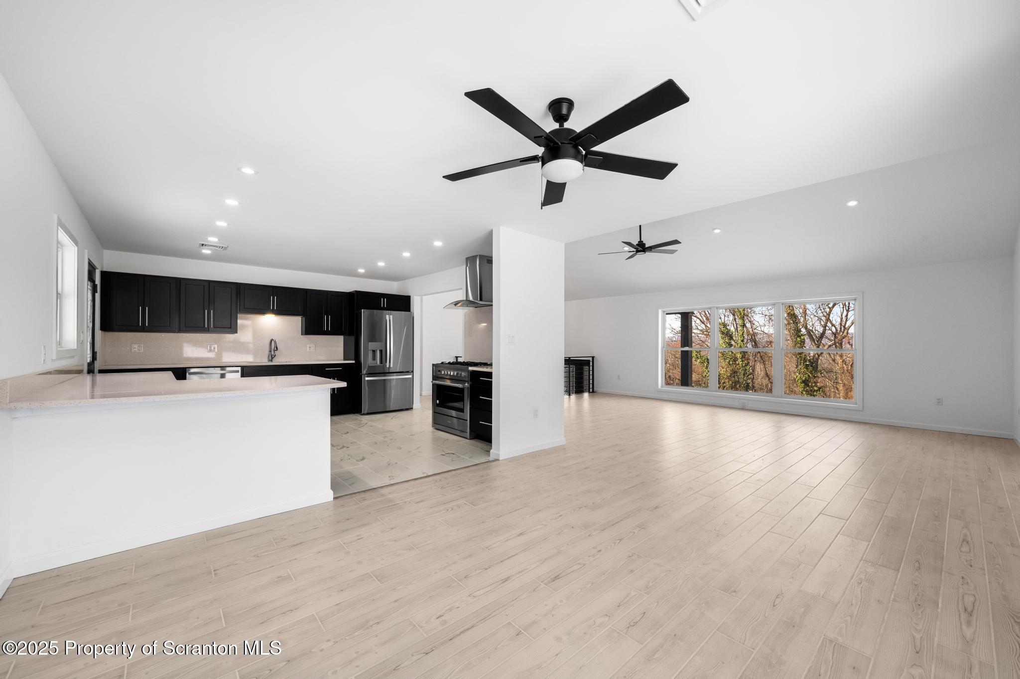 80 Elmhurst Boulevard Scranton, PA 18505 - Photo 11 of 56 a view of a kitchen with a sink and a window