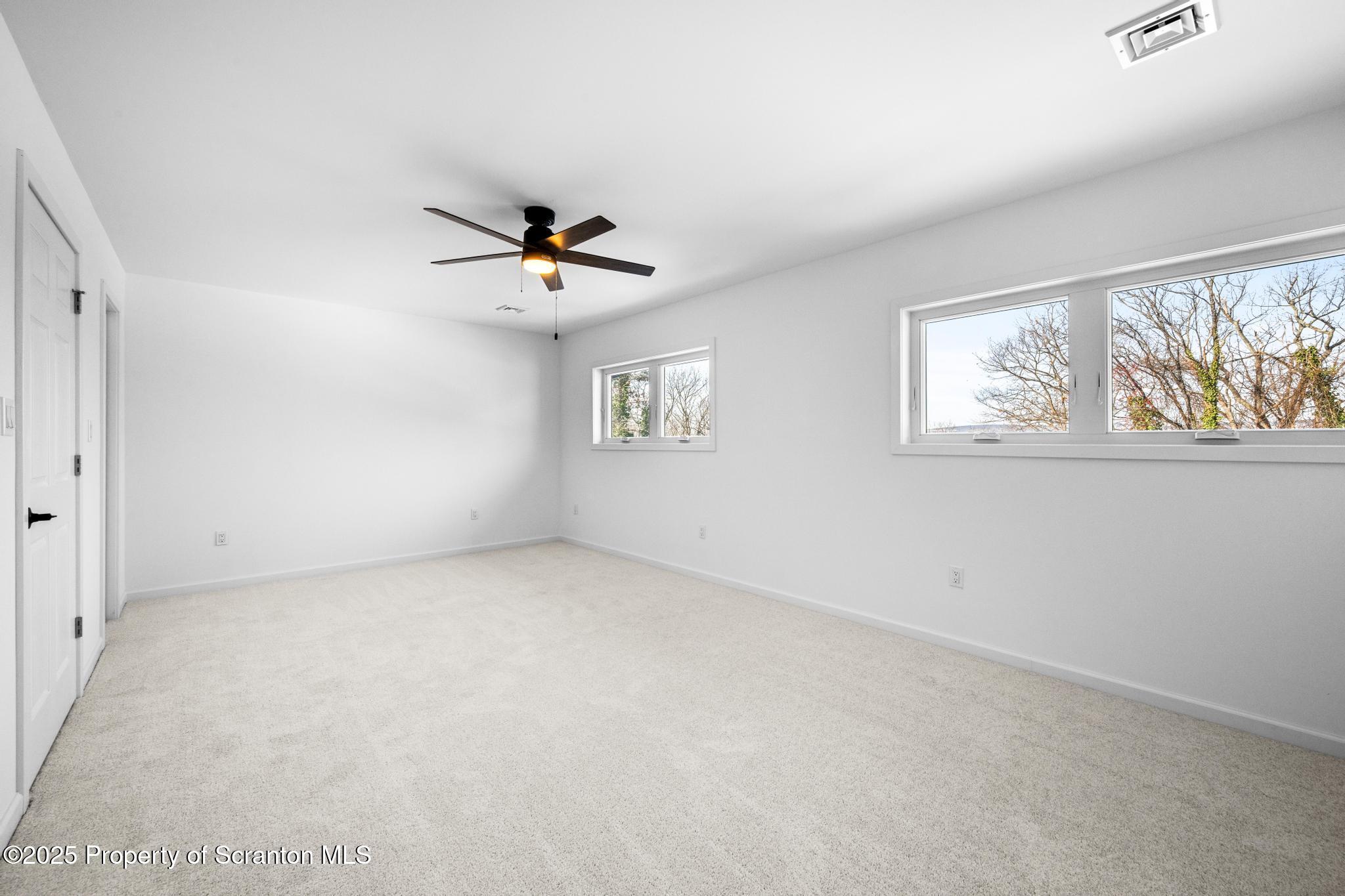 80 Elmhurst Boulevard Scranton, PA 18505 - Photo 17 of 56 a view of an empty room with a window