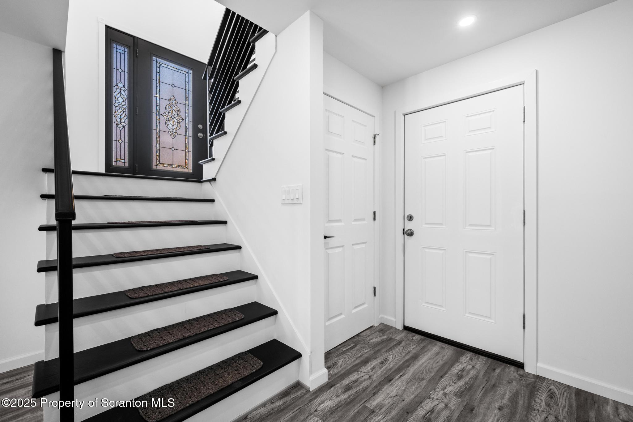80 Elmhurst Boulevard Scranton, PA 18505 - Photo 29 of 56 a view of entryway with stairs and wooden floor