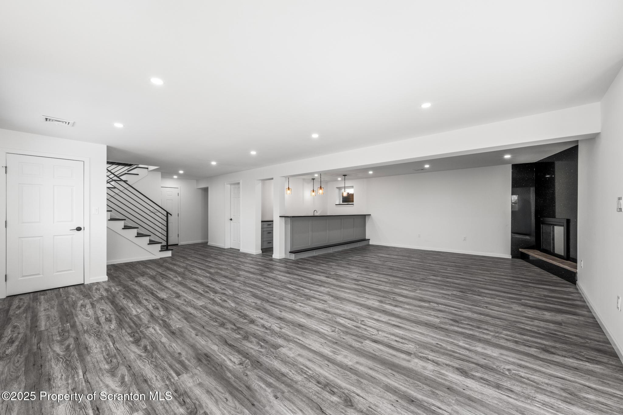 80 Elmhurst Boulevard Scranton, PA 18505 - Photo 36 of 56 a view of an empty room with wooden floor