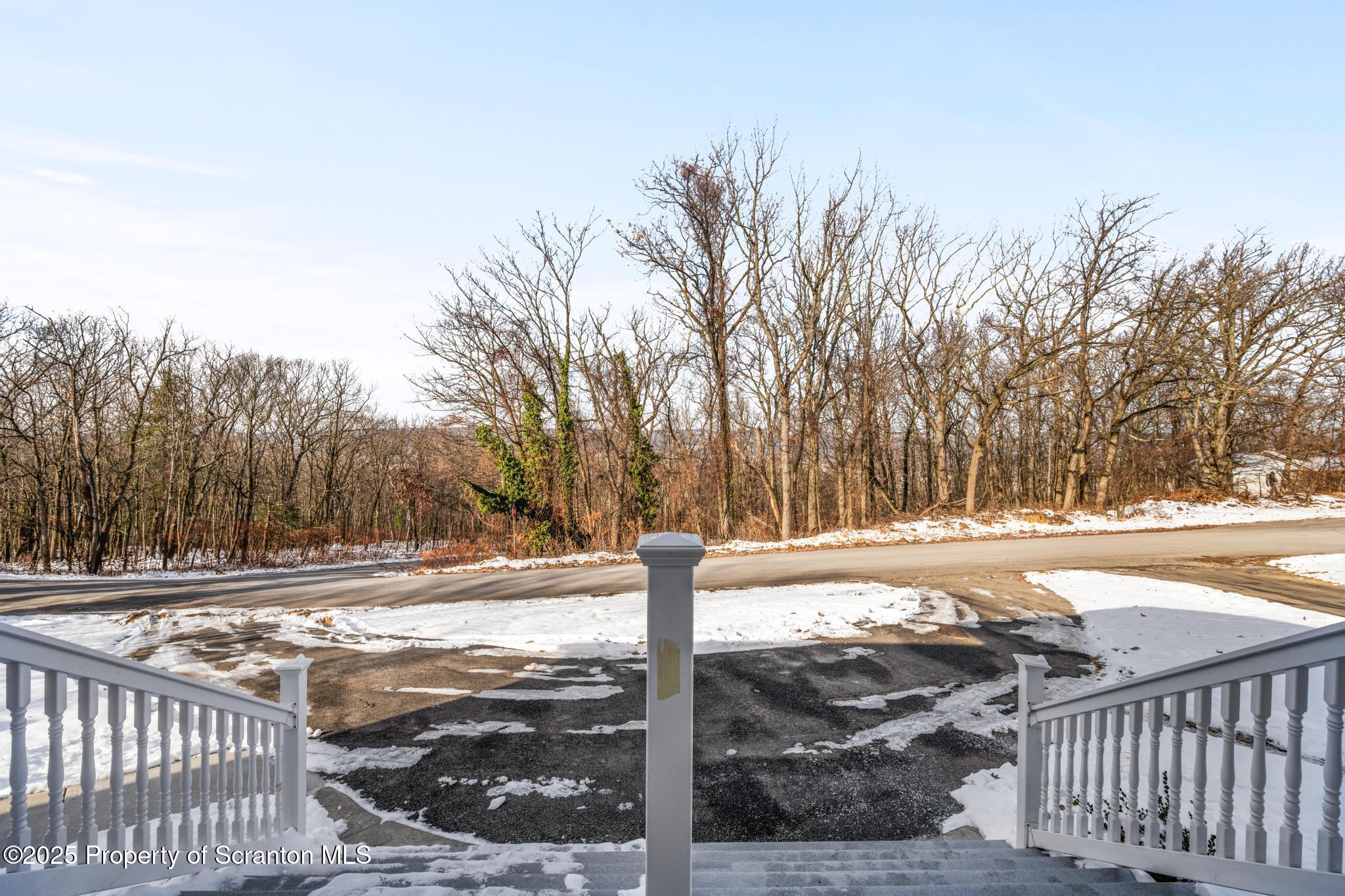 80 Elmhurst Boulevard Scranton, PA 18505 - Photo 4 of 56 a view of a yard with wooden fence