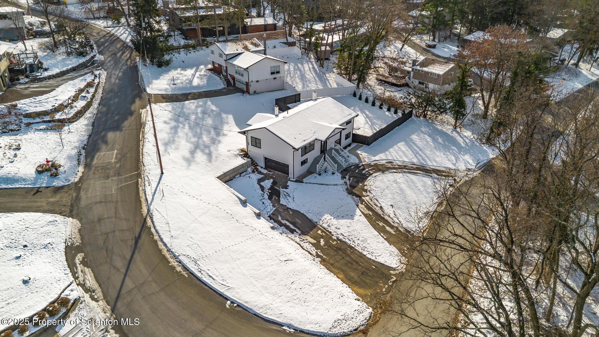 80 Elmhurst Boulevard Scranton, PA 18505 - Photo 45 of 56 an aerial view of a house with swimming pool and sitting space