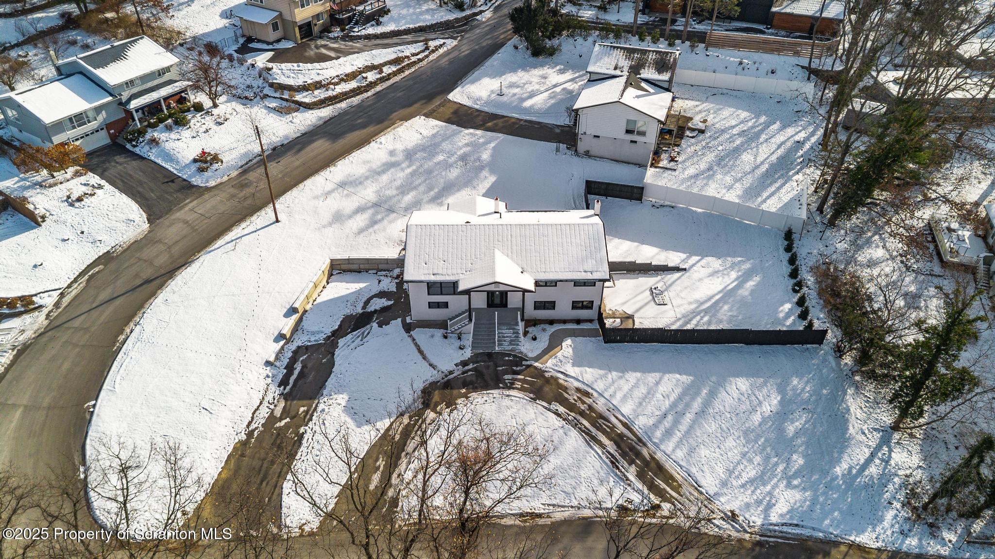 80 Elmhurst Boulevard Scranton, PA 18505 - Photo 46 of 56 an aerial view of a house with garden space and sitting area