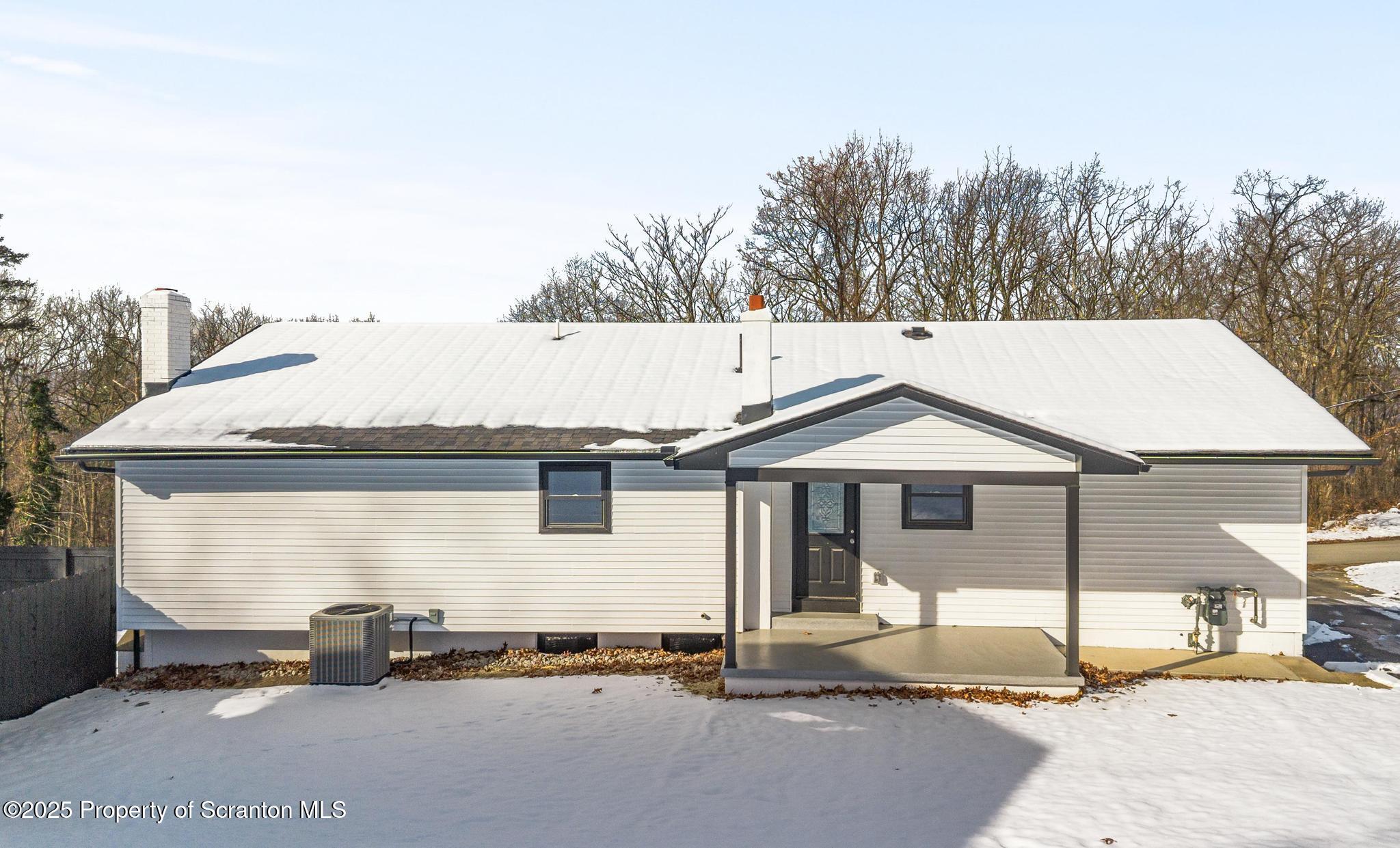 80 Elmhurst Boulevard Scranton, PA 18505 - Photo 52 of 56 a backyard of a house with barbeque oven and outdoor seating
