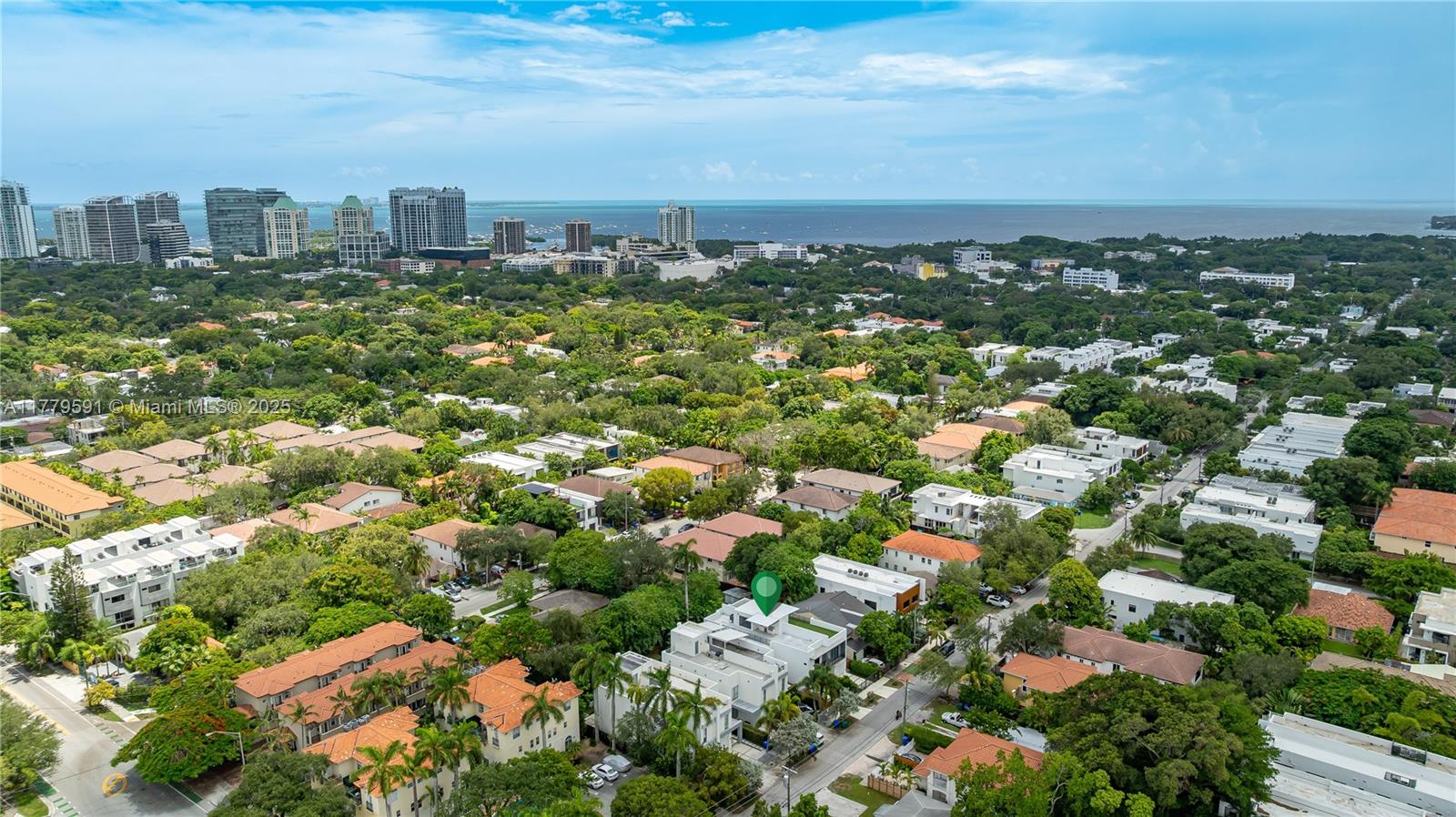 an aerial view of a city with lots of residential buildings