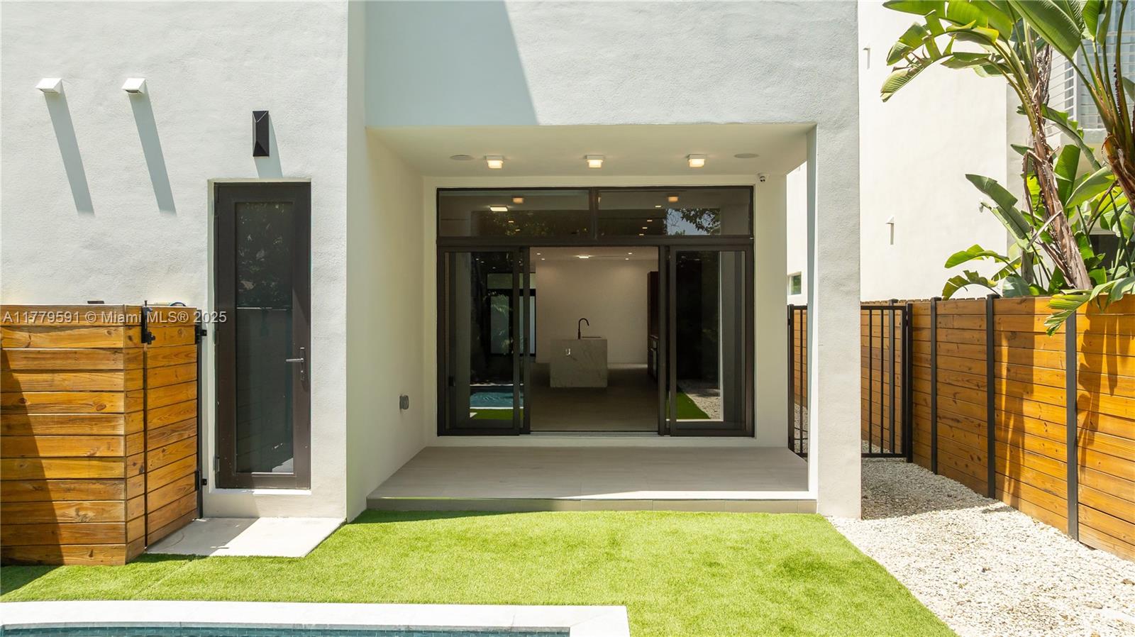 3045 Elizabeth Street, Unit 3045 Miami, FL 33133 - Photo 27 of 72 a view of a entryway door of the house