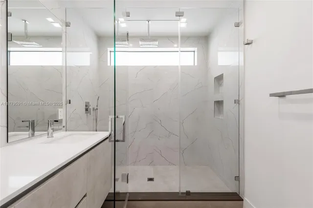 a bathroom with a toilet and a bathtub