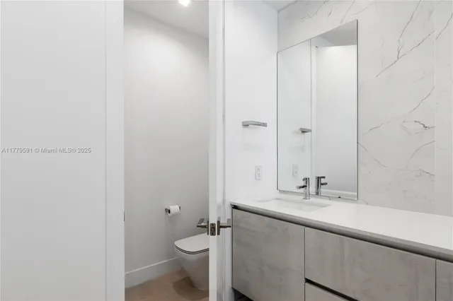 a view of a porch with a floor to ceiling window