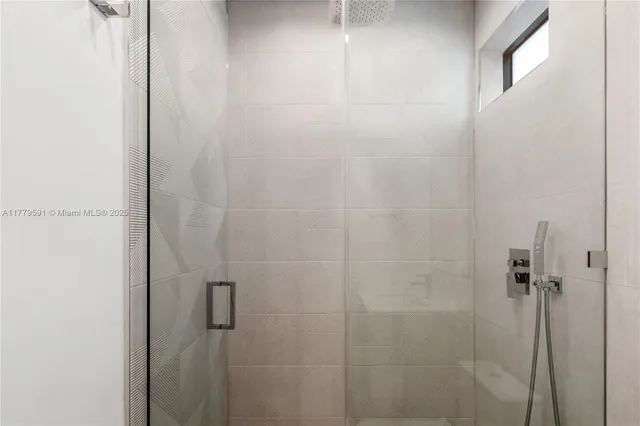 a open kitchen with white cabinets a sink and dishwasher