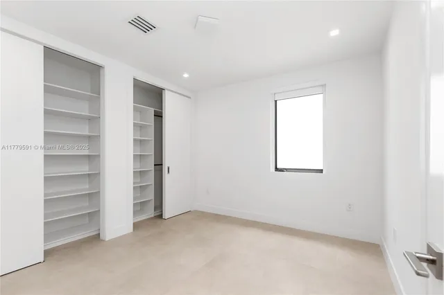 a view of a city with tall buildings