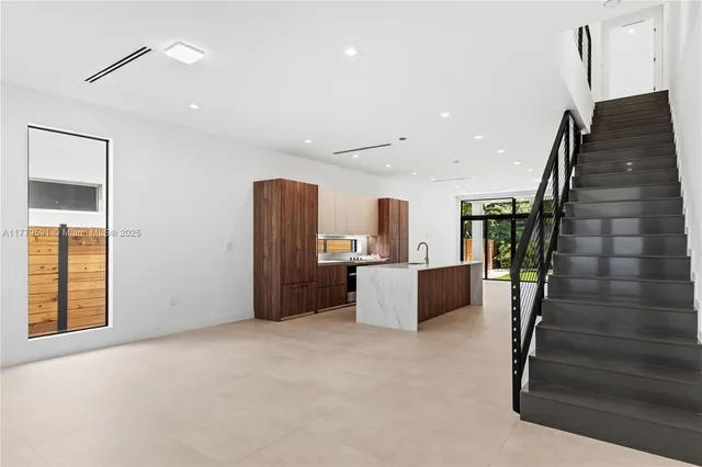 a view of an entryway with stairs