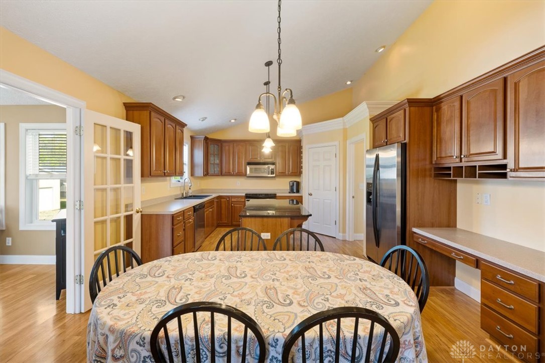 841 Willow Road Springfield, OH 45502 - Photo 8 of 64 This bright kitchen features ample cabinetry and a functional layout, perfect for daily living and entertaining.