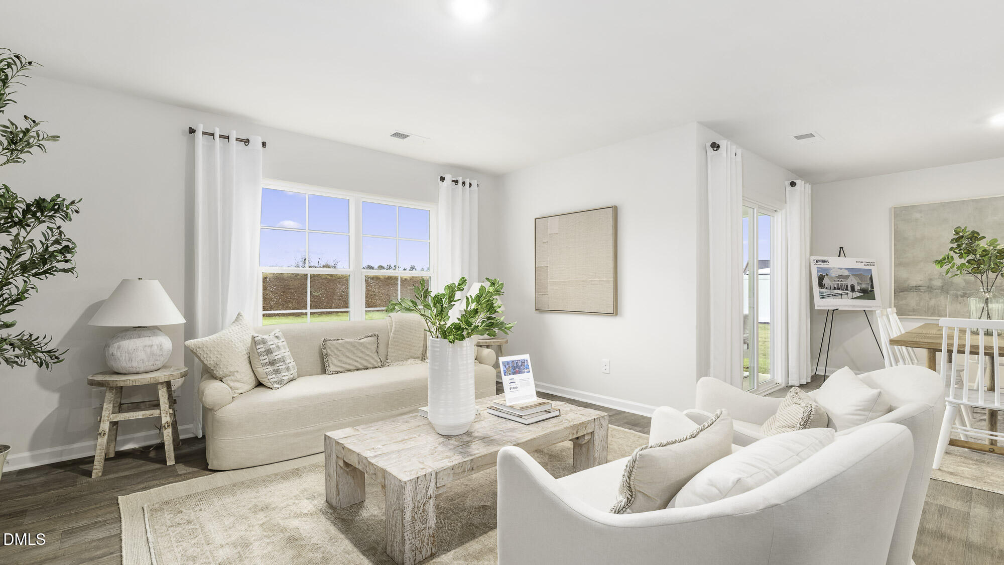 129 Daniel Road Wilson's Mills, NC 27577 - Photo 9 of 28 a living room with furniture and a large window