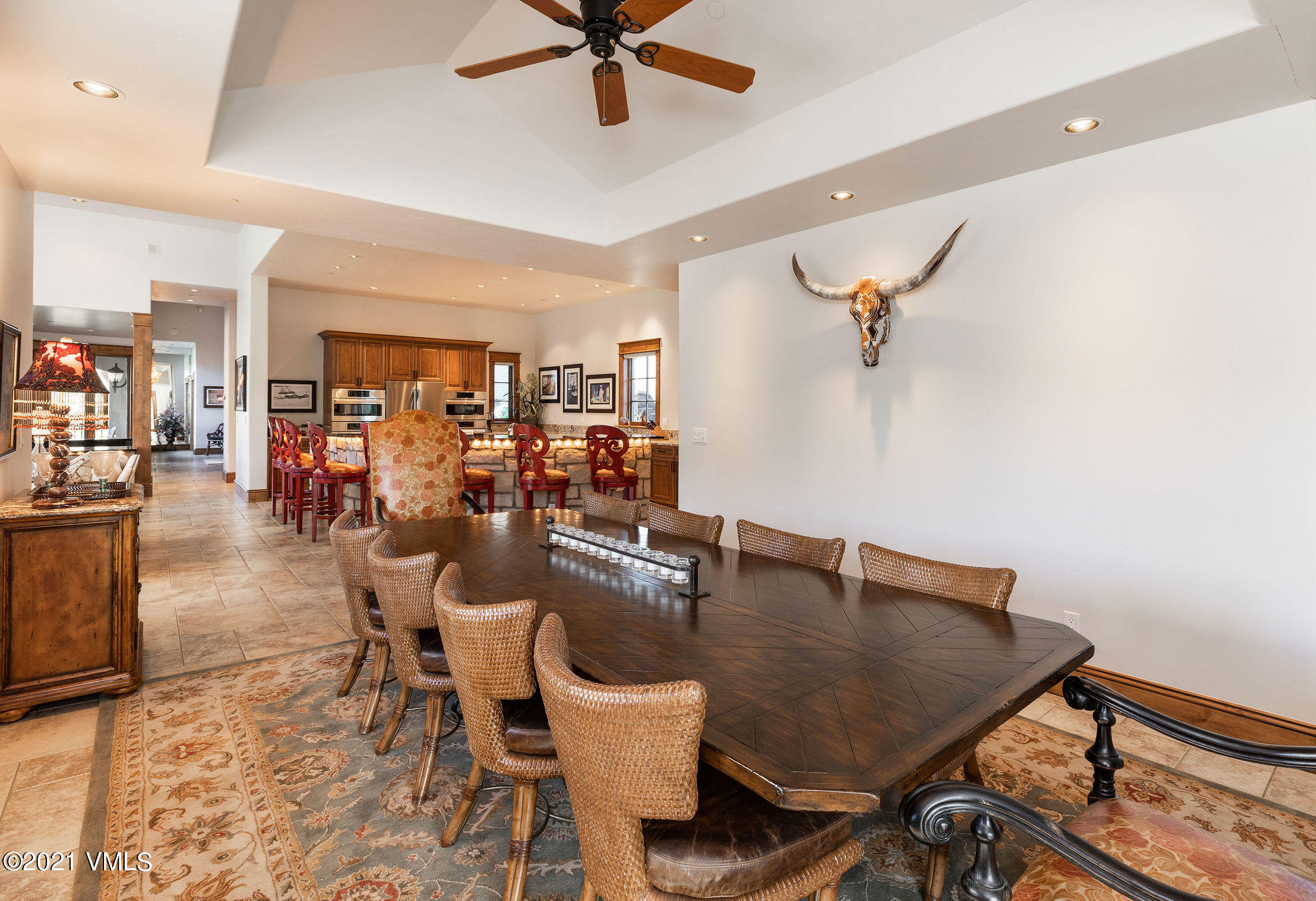 950 Cordillera Way Edwards, CO 81632 - Photo 11 of 26 a dining room with furniture and window