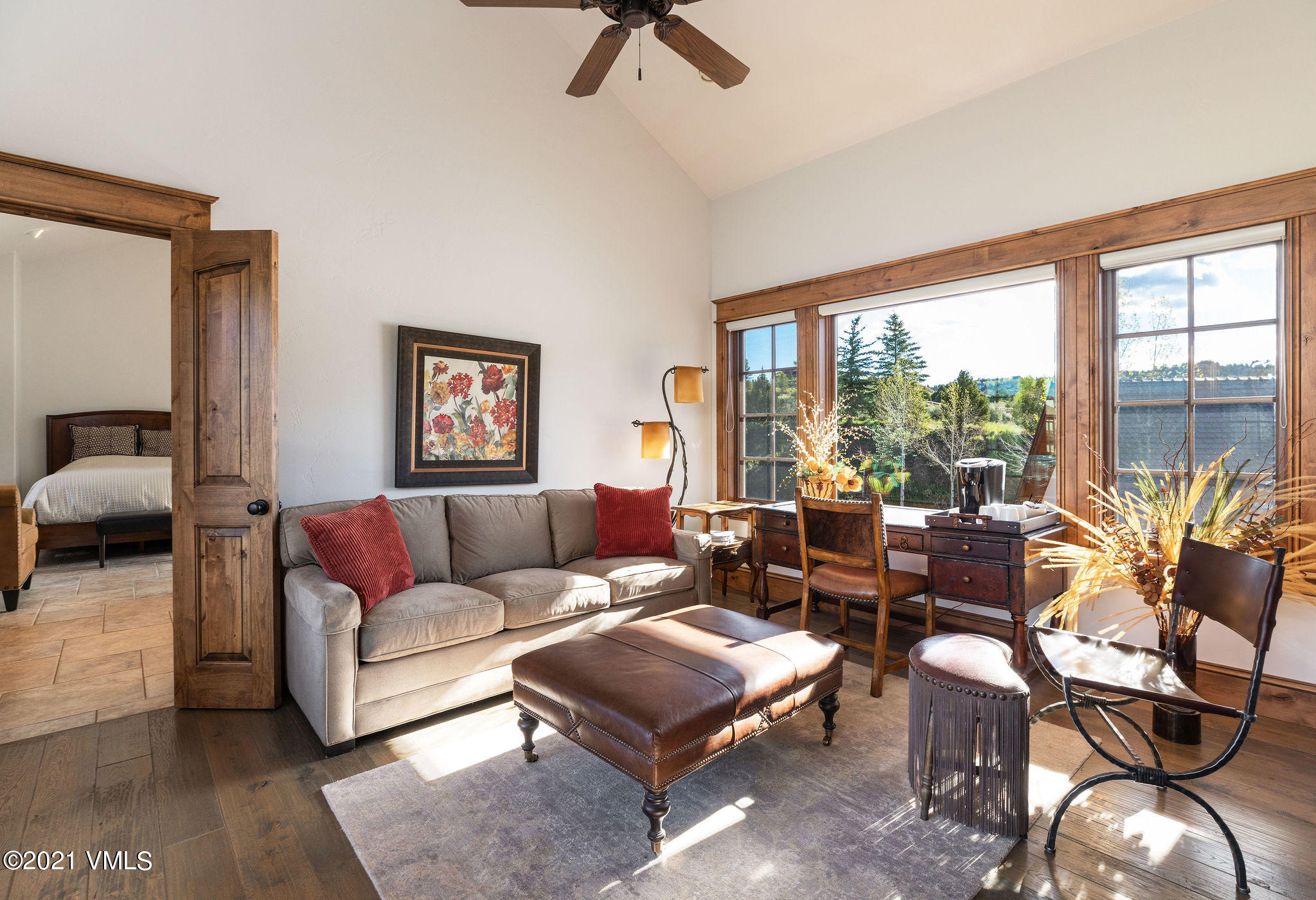 950 Cordillera Way Edwards, CO 81632 - Photo 16 of 26 a living room with furniture and floor to ceiling windows