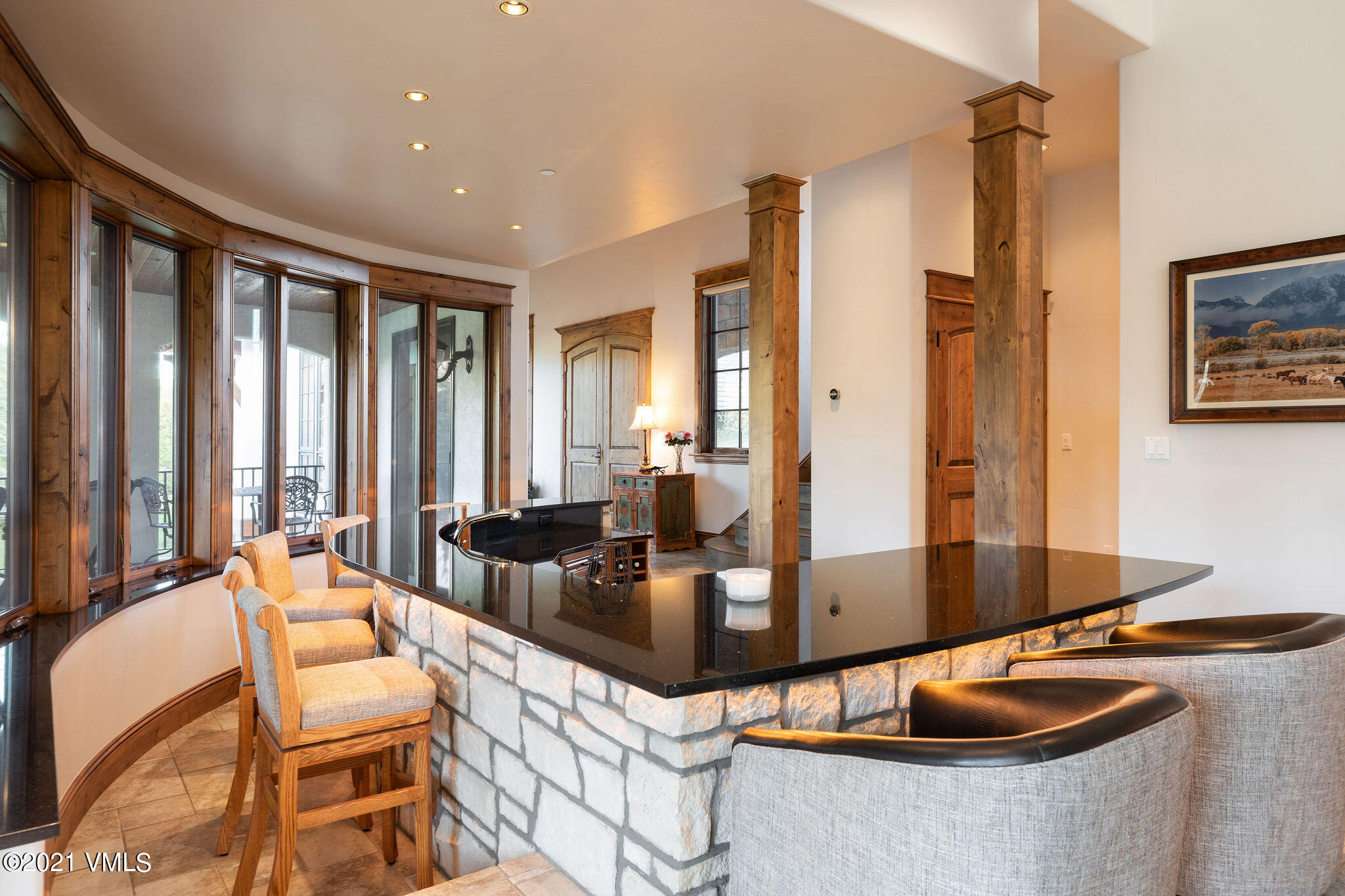 950 Cordillera Way Edwards, CO 81632 - Photo 3 of 26 a dining room with furniture and a large window