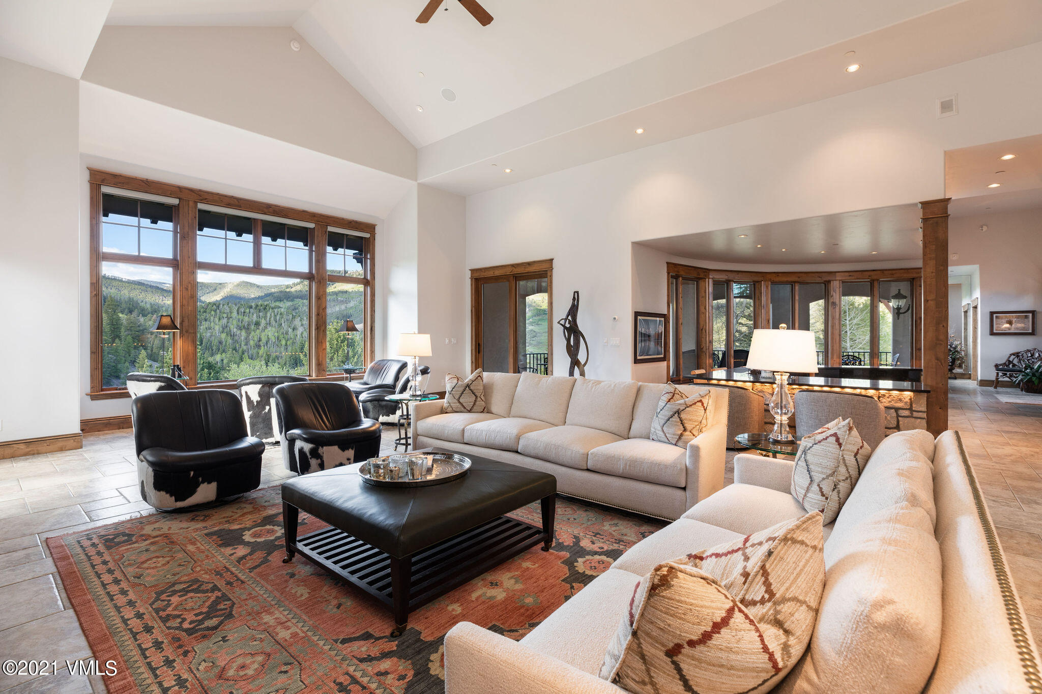 950 Cordillera Way Edwards, CO 81632 - Photo 5 of 26 a living room with furniture and a large window