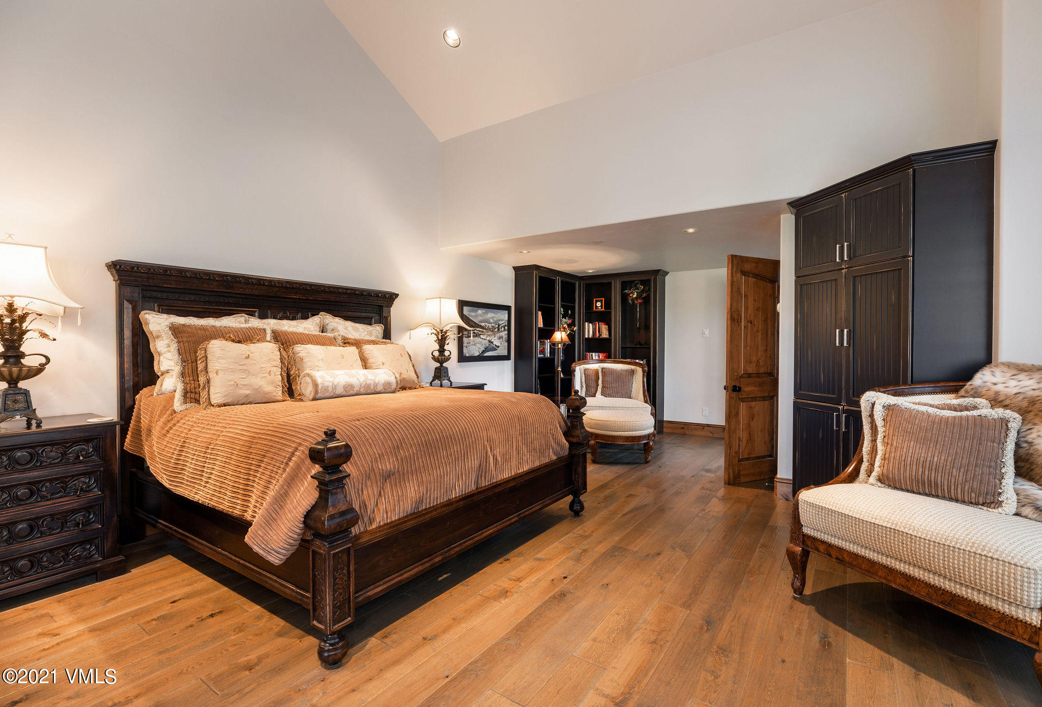 950 Cordillera Way Edwards, CO 81632 - Photo 8 of 26 a bedroom with a bed and a couch