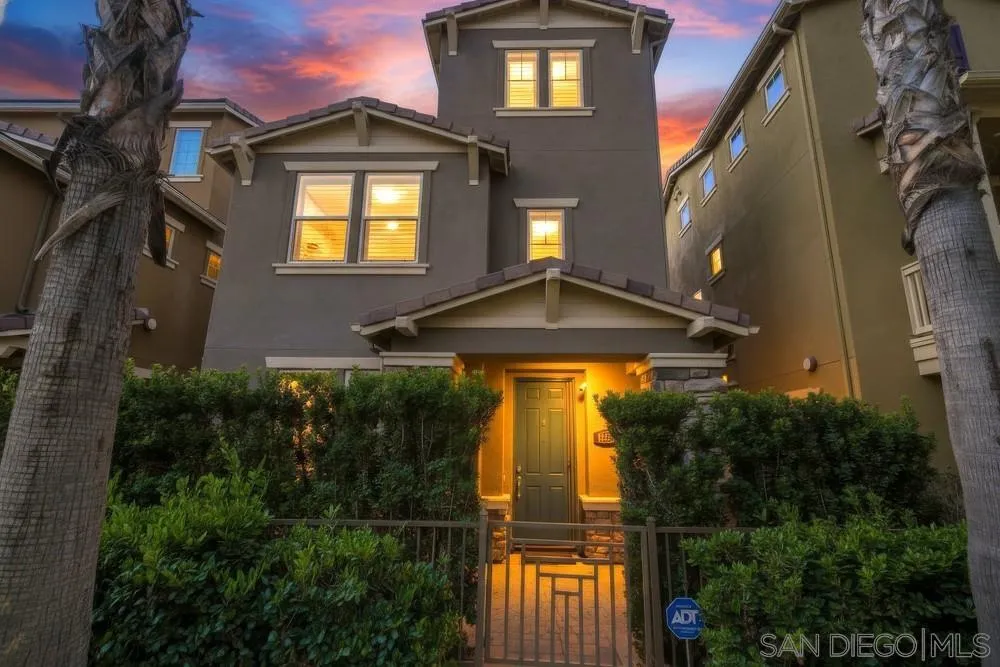 1859 Khaki Lane Chula Vista, CA 91913 - Photo 1 of 62 a front view of a house with a yard