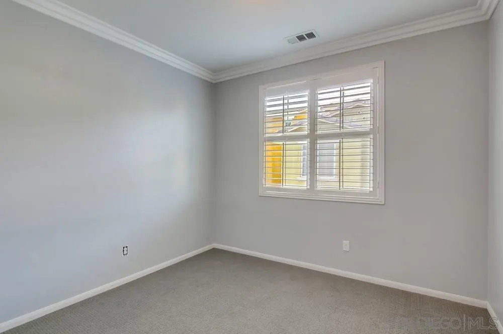 1859 Khaki Lane Chula Vista, CA 91913 - Photo 33 of 62 an empty room with a window