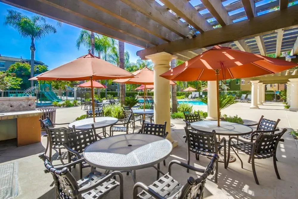 1859 Khaki Lane Chula Vista, CA 91913 - Photo 59 of 62 a patio with a patio table and chairs