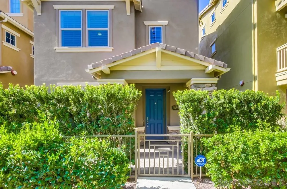 1859 Khaki Lane Chula Vista, CA 91913 - Photo 62 of 62 a view of a house with plants and a small yard